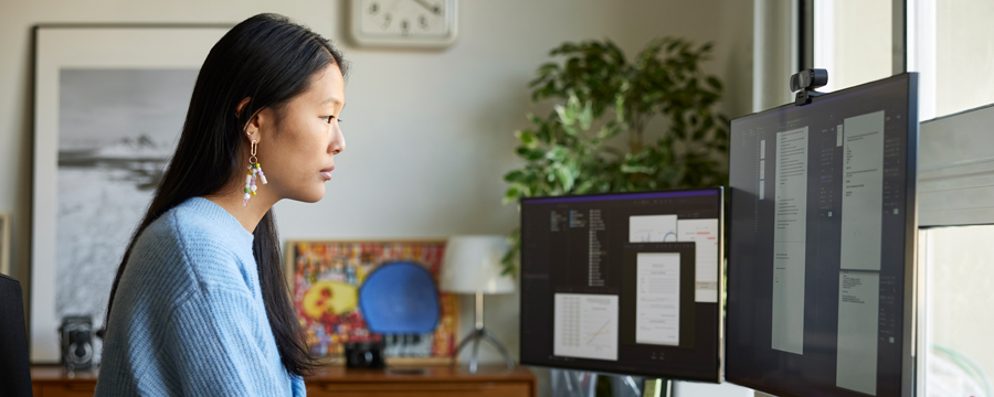 Woman sitting at desk reviewing tax planning strategies