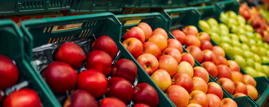 Baskets of fruit at a grocery store.